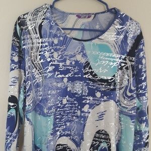 Vibrant blue and silver shirt. Stunning.